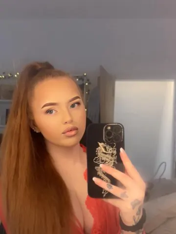 Redheadbabe webcam model from United Kingdom